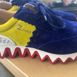 Dark Blue and Yellow Loubishark size 43 Men’s tennis shoes. Like new!